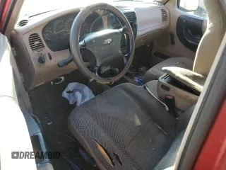 2001 Ford Ranger XL with VIN 1FTYR10C91TA26959, listed as a Copart auction lot 86453044 with 303,676 mi miles and Salvage title. Bid and sale history available at DreamBid. Image 8.