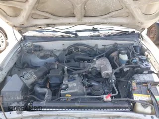 2001 Toyota Tacoma z VIN 5TENL42N11Z856292, wystawiony jako IAAI lot #42226178 z przebiegiem 333 577 mil mil oraz . Historia ofert i sprzedaży dostępna na DreamBid. Obrazek 10.