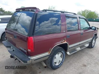 1999 Chevrolet Tahoe Z71 z VIN 1GNEK13R7XJ444925, wystawiony jako IAAI lot #42261246 z przebiegiem 183 530 mil mil oraz . Historia ofert i sprzedaży dostępna na DreamBid. Obrazek 4.