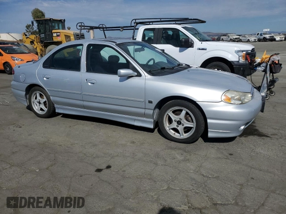 1999 Ford Contour z VIN 1FAFP68G9XK142510, wystawiony jako Copart lot #74818384 z przebiegiem 65 885 mil mil oraz Tytuł czysty. Historia ofert i sprzedaży dostępna na DreamBid. Obrazek 4.