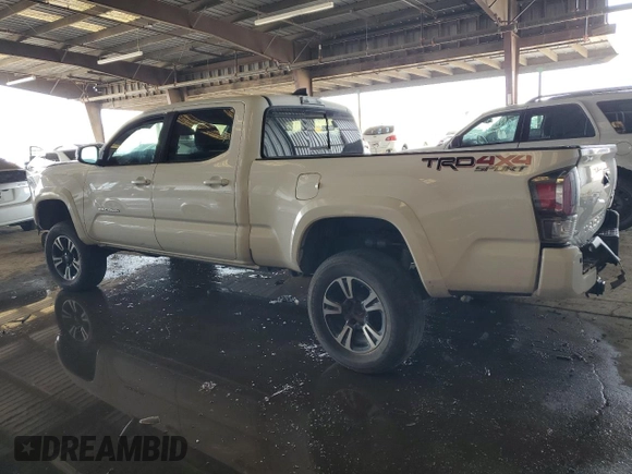 2021 Toyota Tacoma 4WD SR5 with VIN 3TMDZ5BN4MM106693, listed as a Copart auction lot 45278655 with 52,510 mi miles and Salvage Title. Bid and sale history available at carsss.com. Image 2.