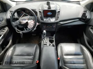 2019 Ford Escape Titanium с VIN 1FMCU9J9XKUA39544, выставлен на аукционе Copart как лот 62363005 с пробегом 80 831 миль миль и Списание • Salvage title. История ставок и продаж доступна на DreamBid. Изображение 8.