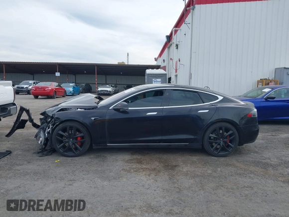 2016 Tesla Model S 90D z VIN 5YJSA1E4XGF171681, wystawiony jako IAAI lot #41836005 z przebiegiem 81 063 mil mil oraz . Historia ofert i sprzedaży dostępna na DreamBid. Obrazek 15.