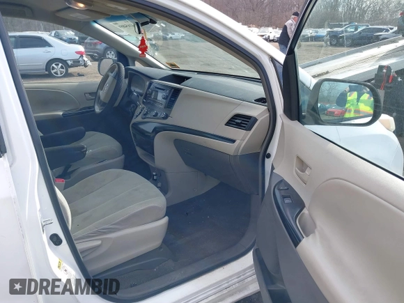 2011 Toyota Sienna with VIN 5TDZK3DC3BS058823, listed as a IAAI auction lot 41654859 with 227,969 mi miles. Bid and sale history available at carsss.com. Image 5.