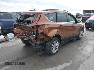 2017 Ford Escape SE with VIN 1FMCU0GD5HUE08097, listed as a IAAI auction lot 41499800 with 70,911 mi miles. Bid and sale history available at carsss.com. Image 4.