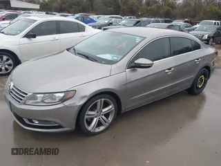 2013 Volkswagen CC Sport with VIN WVWBN7AN5DE514299, listed as a IAAI auction lot 41563521 with 199,249 mi miles. Bid and sale history available at carsss.com. Image 2.
