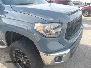 2011 Toyota Tundra 4WD Truck with VIN 5TFDW5F12BX181982, listed as a IAAI auction lot 42084985 with 222,356 mi miles. Bid and sale history available at carsss.com. Image 1.
