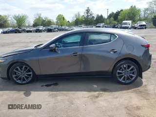 2023 Mazda 3 S Select with VIN JM1BPAKM3P1615785, listed as a IAAI auction lot 42064302 with 63,928 mi miles and . Bid and sale history available at DreamBid. Image 14.