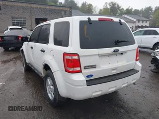 2010 Ford Escape XLS with VIN 1FMCU9C70AKC41802, listed as a IAAI auction lot 42163243 with 106,189 mi miles and . Bid and sale history available at DreamBid. Image 3.