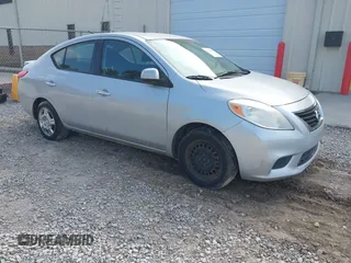 2014 Nissan Versa SV with VIN 3N1CN7APXEK453063, listed as a IAAI auction lot 42163061 with 176,437 mi miles. Bid and sale history available at carsss.com. Image 1.