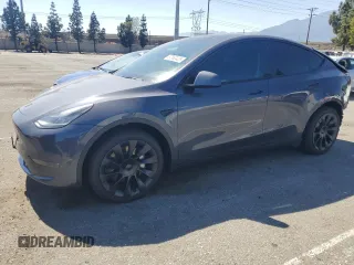 2022 Tesla Model Y Long Range z VIN 7SAYGDEE3NF507044, wystawiony jako Copart lot #57560425 z przebiegiem 46 853 mil mil oraz Czysty tytuł • Clean title. Historia ofert i sprzedaży dostępna na DreamBid. Obrazek 1.