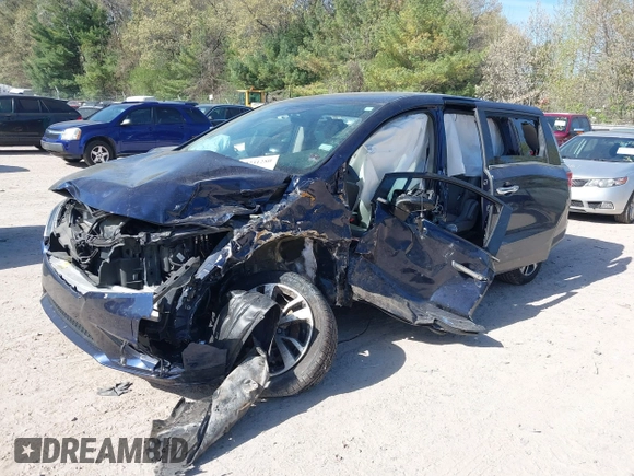 2020 Honda Odyssey Elite with VIN 5FNRL6H95LB052590, listed as a IAAI auction lot 42231280 with 65,165 mi miles and . Bid and sale history available at DreamBid. Image 18.