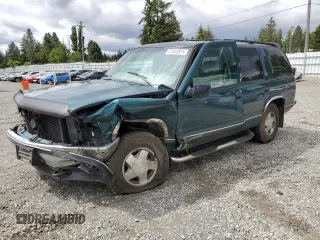 1998 Chevrolet Tahoe z VIN 1GNEK13R2WJ304666, wystawiony jako Copart lot #57833815 z przebiegiem 199 103 mil mil oraz Szkoda całkowita • Salvage title. Historia ofert i sprzedaży dostępna na DreamBid. Obrazek 1.