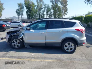 2015 Ford Escape SE with VIN 1FMCU0GX6FUA40651, listed as a IAAI auction lot 42117925 with 121,469 mi miles and . Bid and sale history available at DreamBid. Image 13.