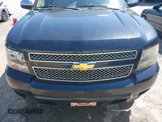 2011 Chevrolet Suburban LTZ with VIN 1GNSKKE31BR299912, listed as a IAAI auction lot 41990351 with 268,982 mi miles. Bid and sale history available at carsss.com. Image 12.
