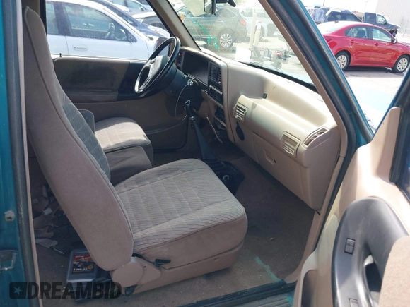 1994 Ford Ranger Splash with VIN 1FTCR15X8RPB51199, listed as a IAAI auction lot 42123779 with 203,940 mi miles. Bid and sale history available at carsss.com. Image 5.