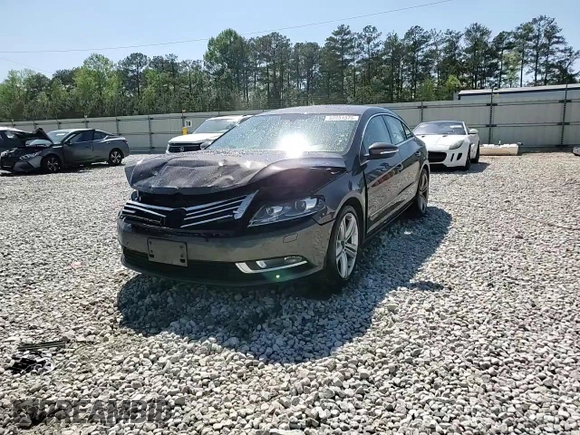 2013 Volkswagen CC Sport Plus z VIN WVWBP7AN7DE515951, wystawiony jako Copart lot #52251575 z przebiegiem 121 414 mil mil oraz Szkody całkowita. Historia ofert i sprzedaży dostępna na DreamBid. Obrazek 13.