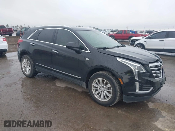 2017 Cadillac XT5 FWD with VIN 1GYKNARS0HZ317508, listed as a IAAI auction lot 40818768 with 132,598 mi miles. Bid and sale history available at carsss.com. Image 1.