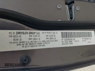 2013 Chrysler 300 with VIN 2C3CCABG7DH611105, listed as a IAAI auction lot 41769860 with 186,476 mi miles. Bid and sale history available at carsss.com. Image 9.