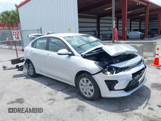 2023 Kia Rio S z VIN 3KPA24AD4PE604207, wystawiony jako IAAI lot #42077201 z przebiegiem 16 559 mil mil oraz . Historia ofert i sprzedaży dostępna na DreamBid. Obrazek 1.