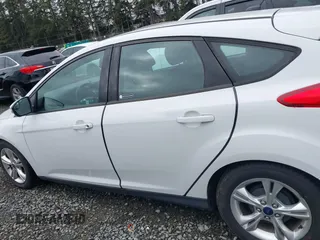 2014 Ford Focus SE z VIN 1FADP3K29EL185755, wystawiony jako IAAI lot #41730618 z przebiegiem 58 707 mil mil oraz . Historia ofert i sprzedaży dostępna na DreamBid. Obrazek 14.