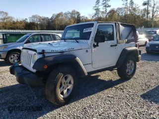 2010 Jeep Wrangler Rubicon with VIN 1J4BA6D17AL132002, listed as a Copart auction lot 83869124 with 183,507 mi miles and Salvage title. Bid and sale history available at DreamBid. Image 1.