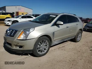 2015 Cadillac SRX Premium Collection z VIN 3GYFNDE32FS536692, wystawiony jako Copart lot #54669175 z przebiegiem 80 484 mil mil oraz Szkoda całkowita • Salvage title. Historia ofert i sprzedaży dostępna na DreamBid. Obrazek 1.
