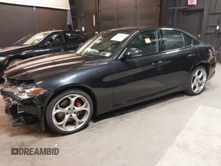 2021 Alfa Romeo Giulia Ti z VIN ZARFANBN7M7644482, wystawiony jako IAAI lot #42502199 z przebiegiem 27 962 mil mil oraz . Historia ofert i sprzedaży dostępna na DreamBid. Obrazek 20.