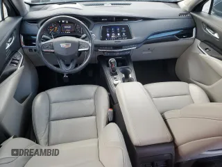 2021 Cadillac XT4 AWD Premium Luxury with VIN 1GYFZDR4XMF007080, listed as a Copart auction lot 87943335 with 36,379 mi miles and Salvage Title. Bid and sale history available at carsss.com. Image 8.