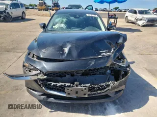 2021 Mazda 3 S with VIN JM1BPAAL1M1303601, listed as a Copart auction lot 63101125 with 82,041 mi miles and Salvage title. Bid and sale history available at DreamBid. Image 5.