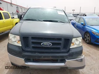 2005 Ford F-150 XL with VIN 1FTRF14555KB88186, listed as a IAAI auction lot 41815601 with 195,049 mi miles. Bid and sale history available at carsss.com. Image 12.