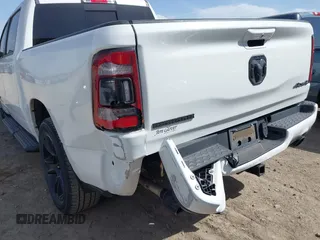2021 Ram 1500 Big Horn with VIN 1C6SRFFT0MN521027, listed as a IAAI auction lot 41830596 with 55,013 mi miles and . Bid and sale history available at DreamBid. Image 20.