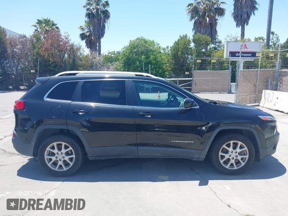 2016 Jeep Cherokee Latitude with VIN 1C4PJLCS8GW260180, listed as a IAAI auction lot 42649326 with 207,732 mi miles and . Bid and sale history available at DreamBid. Image 13.