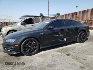 2018 Audi A7 Premium Plus with VIN WAUW3AFC0JN002860, listed as a Copart auction lot 73176884 with 100,397 mi miles and Salvage Title. Bid and sale history available at carsss.com. Image 1.