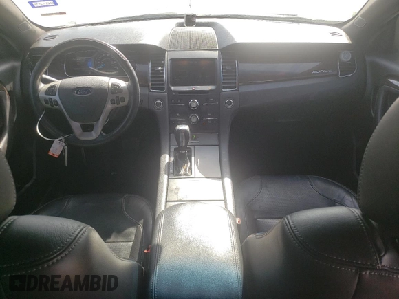 2015 Ford Taurus Limited with VIN 1FAHP2F83FG106102, listed as a Copart auction lot 49819005 with 100,925 mi miles and Salvage Title. Bid and sale history available at DreamBid. Image 8.