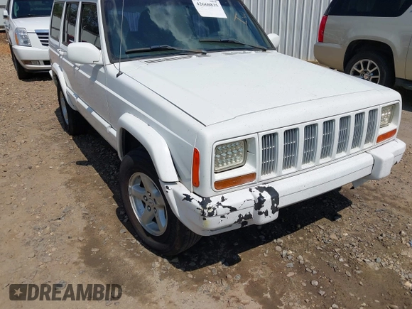 2001 Jeep Cherokee Sport with VIN 1J4FT48S71L503551, listed as a IAAI auction lot 42660835 with Not provided miles and . Bid and sale history available at DreamBid. Image 6.