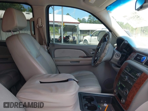 2007 Chevrolet Suburban LT z VIN 1GNFC160X7R218023, wystawiony jako IAAI lot #42305941 z przebiegiem 237 987 mil mil oraz . Historia ofert i sprzedaży dostępna na DreamBid. Obrazek 5.
