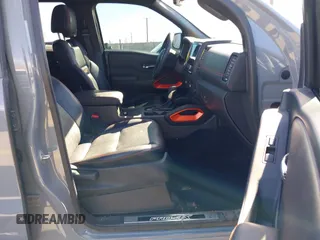 2023 Nissan Frontier SV with VIN 1N6ED1EK2PN633278, listed as a IAAI auction lot 41854671 with 59,549 mi miles and . Bid and sale history available at DreamBid. Image 5.