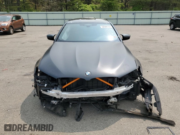 2021 BMW M5 z VIN WBS83CH04MCG92781, wystawiony jako Copart lot #52568153 z przebiegiem 29 528 mil mil oraz . Historia ofert i sprzedaży dostępna na DreamBid. Obrazek 5.