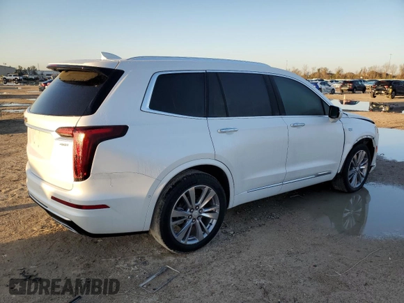 2023 Cadillac XT6 FWD Premium Luxury z VIN 1GYKPCRS5PZ120905, wystawiony jako Copart lot #48533775 z przebiegiem 30 694 mil mil oraz Szkoda całkowita • Salvage title. Historia ofert i sprzedaży dostępna na DreamBid. Obrazek 3.