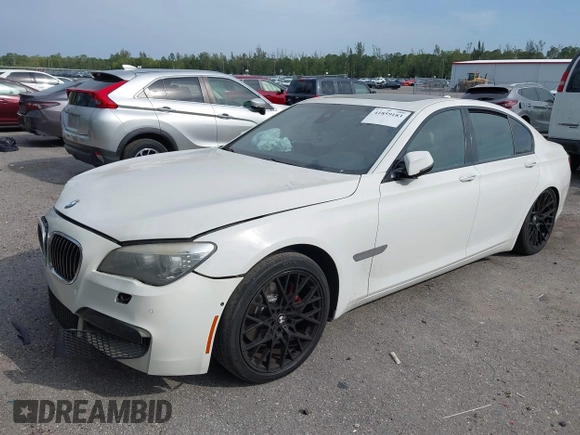 2013 BMW 7 Series 740i with VIN WBAYA6C52DD143862, listed as a IAAI auction lot 41859183 with 133,666 mi miles. Bid and sale history available at carsss.com. Image 18.