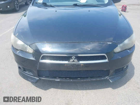 2010 Mitsubishi Lancer GTS z VIN JA32X8HWXAU002021, wystawiony jako IAAI lot #42523978 z przebiegiem 165 635 mil mil oraz . Historia ofert i sprzedaży dostępna na DreamBid. Obrazek 6.