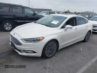2017 Ford Fusion SE with VIN 3FA6P0HD0HR180188, listed as a IAAI auction lot 42146020 with 100,901 mi miles and . Bid and sale history available at DreamBid. Image 2.