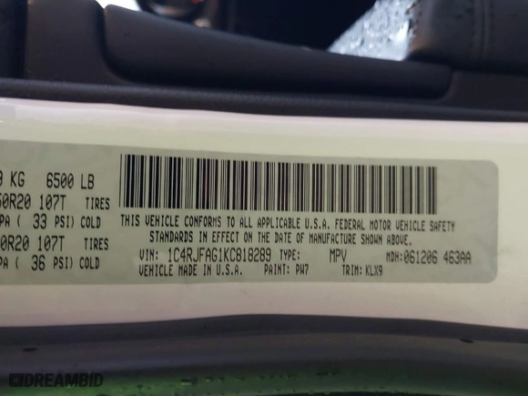 2019 Jeep Grand Cherokee Laredo E with VIN 1C4RJFAG1KC818289, listed as a IAAI auction lot 41602541 with 59,356 mi miles. Bid and sale history available at carsss.com. Image 9.
