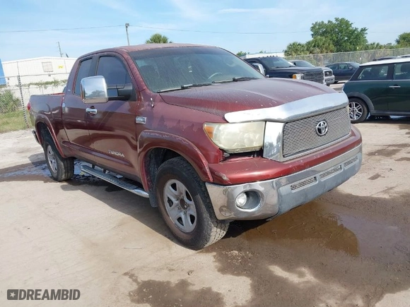 2007 Toyota Tundra SR5 with VIN 5TFRV54157X014065, listed as a IAAI auction lot 42071338 with 312,592 mi miles. Bid and sale history available at carsss.com. Image 1.