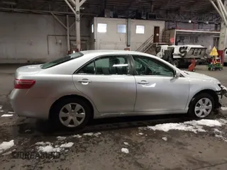2009 Toyota Camry z VIN 4T1BE46KX9U352465, wystawiony jako IAAI lot #41518299 z przebiegiem 107 348 mil mil oraz . Historia ofert i sprzedaży dostępna na DreamBid. Obrazek 13.