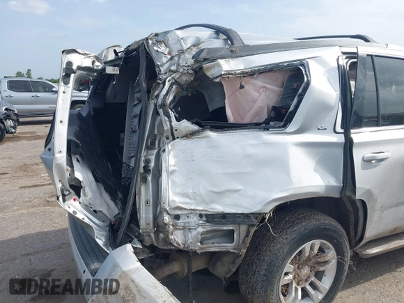 2016 Chevrolet Tahoe LS with VIN 1GNSCAEC2GR392937, listed as a IAAI auction lot 42648714 with 166,764 mi miles and . Bid and sale history available at DreamBid. Image 6.