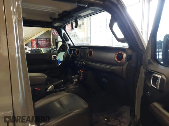 2021 Jeep Gladiator Mojave with VIN 1C6JJTEG1ML596109, listed as a IAAI auction lot 41783913 with 71,112 mi miles and . Bid and sale history available at DreamBid. Image 5.