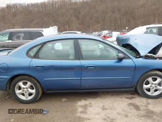 2004 Ford Taurus SE with VIN 1FAFP53U74A140294, listed as a IAAI auction lot 41630953 with Not Provided miles and . Bid and sale history available at DreamBid. Image 14.