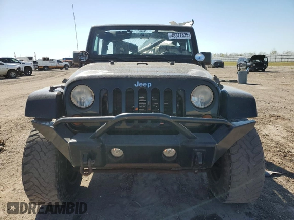 2012 Jeep Wrangler Sahara z VIN 1C4AJWBG1CL216425, wystawiony jako Copart lot #48377825 z przebiegiem 99 649 mil mil oraz Szkoda całkowita • Salvage title. Historia ofert i sprzedaży dostępna na DreamBid. Obrazek 5.